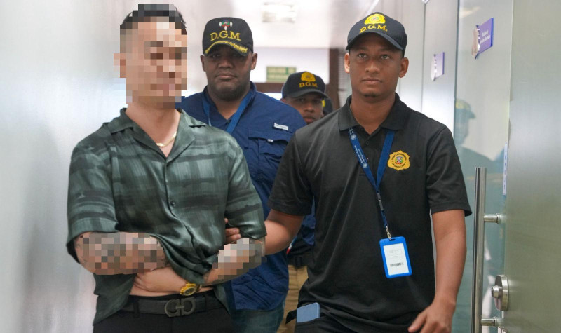 Aplazan medida de coerción contra chino propietario de Mudan acusado de violencia de género